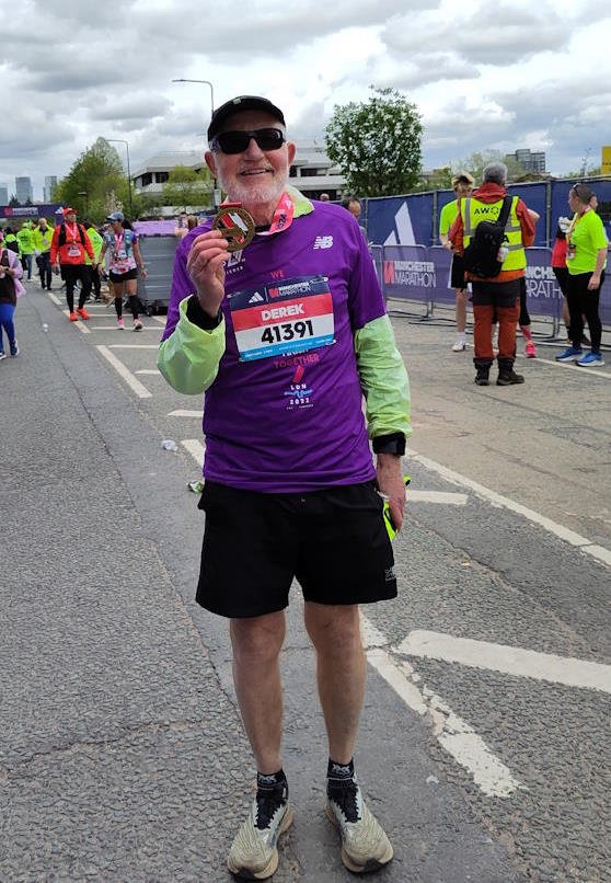Derek at the end of the 2024 Manchester Marathon, which he ran for RADAR